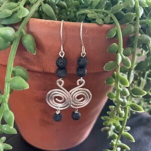 Handcrafted Silver Spiral Earrings with Black Lava Beads